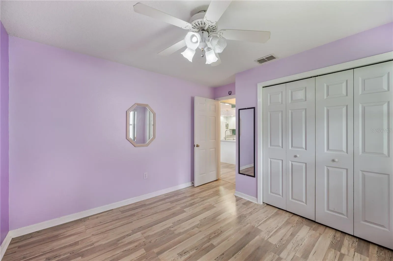 Guest Bedroom 3, laminate and built in closet