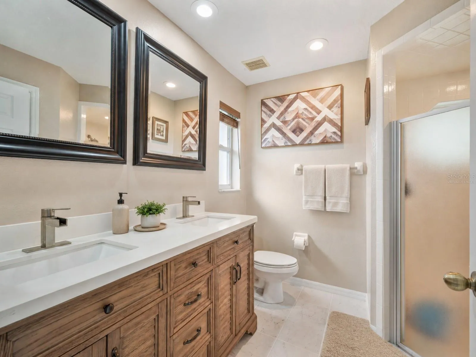 Double Vanity Primary Bath with walk in shower - Virtually Staged