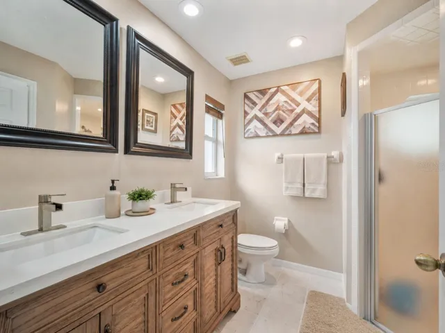 Double Vanity Primary Bath with walk in shower - Virtually Staged