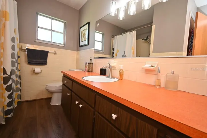 DOWNSTAIRS BATH RM ATTACHED TO PRIMARY BDRM