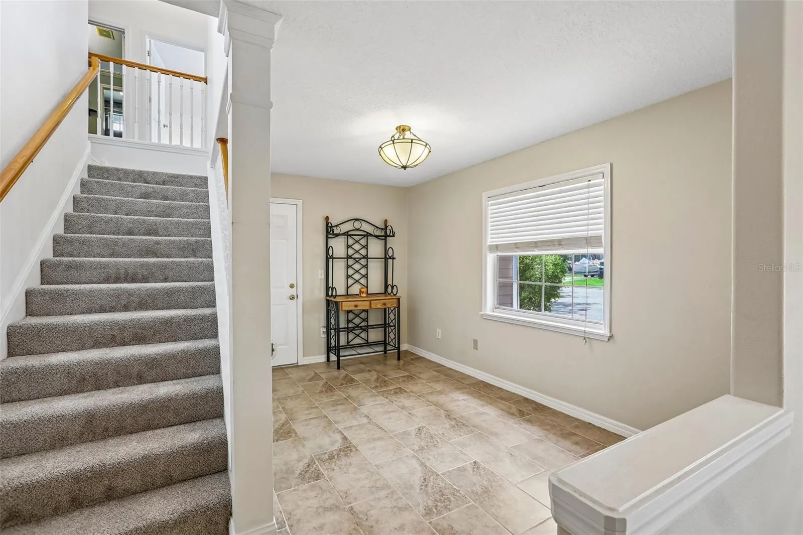 Second floor has 2 bedrooms, living room and full bathroom