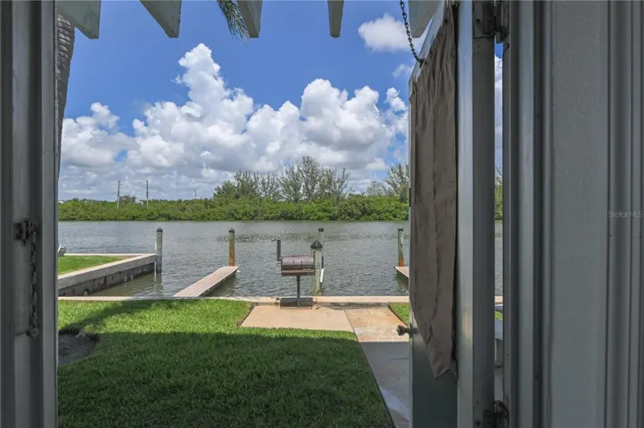 Step outside and enjoy direct access to the Intracoastal waterfront, docks, and peaceful water views just beyond the unit.