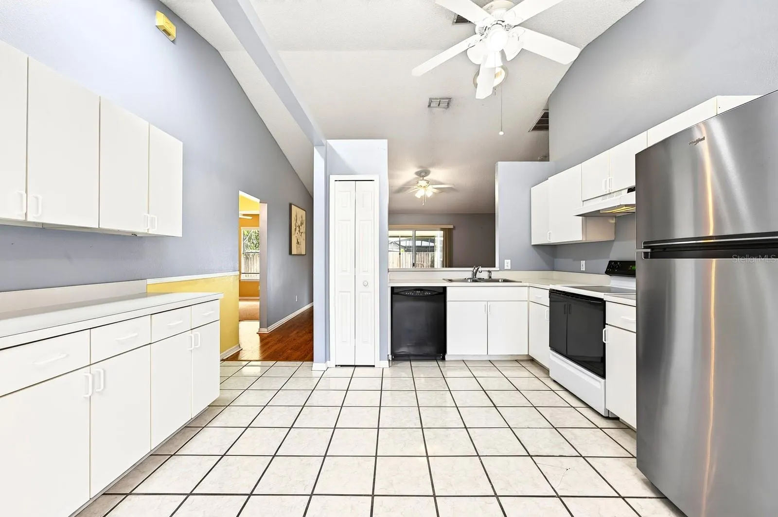 From the Kitchen, enjoy open sight lines into the Living Room.