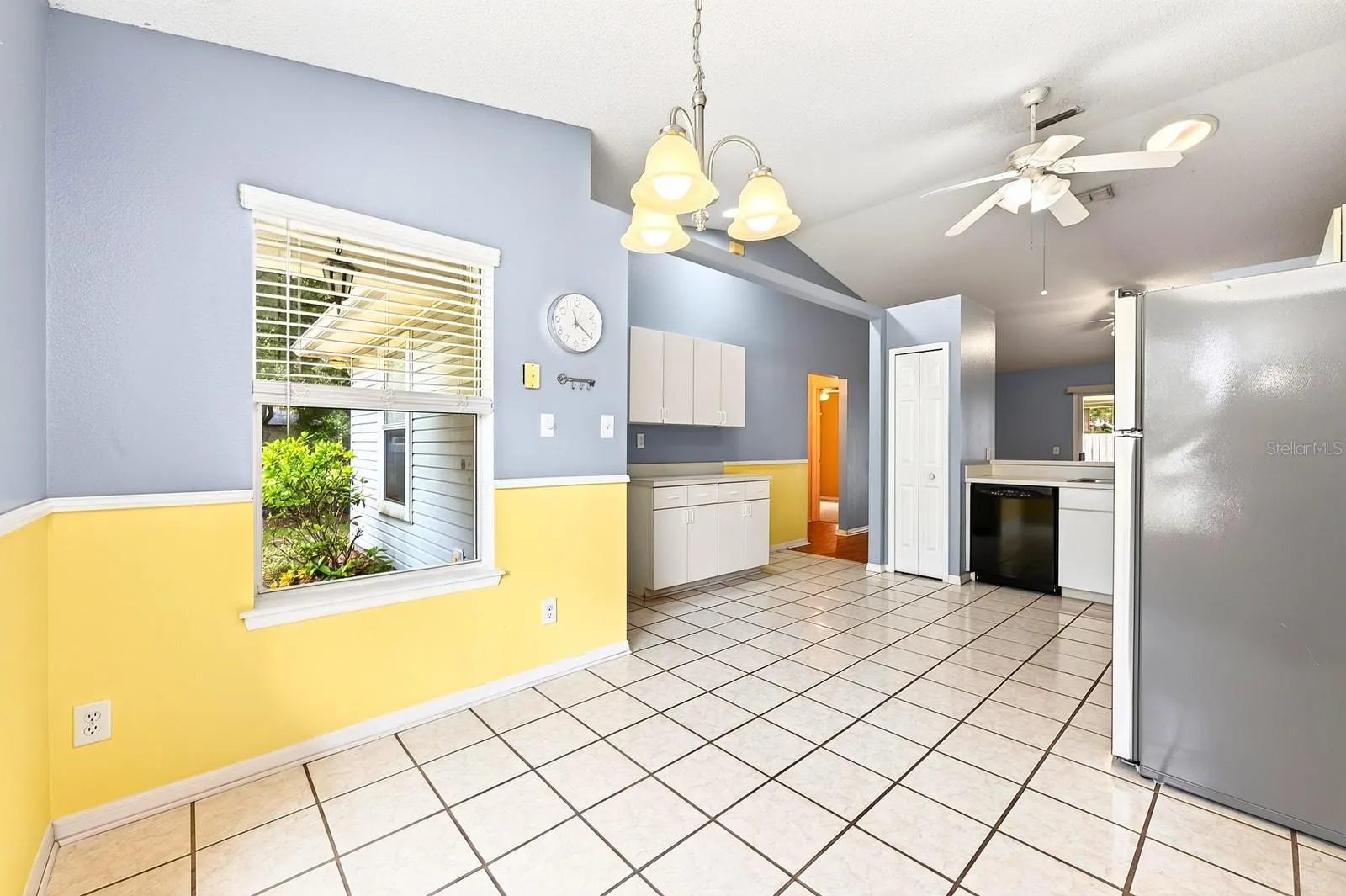 The charming Dining space provides a comfortable spot for casual meals or quiet dinners at home.
