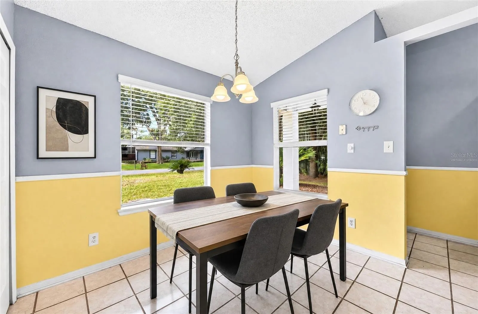 The charming Dining space provides a comfortable spot for casual meals or quiet dinners at home. Virtually Staged