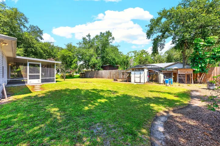 Enjoy the GENEROUS BACKYARD where you’ll also find a small STORAGE SHED and plenty of room for gardening, play or simply enjoying the peaceful surroundings.