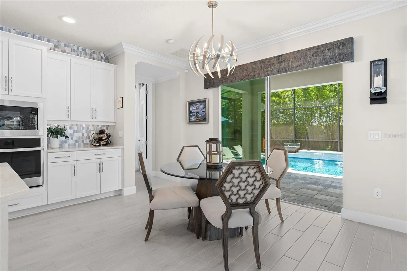 Casual dining with a view of the pool.
