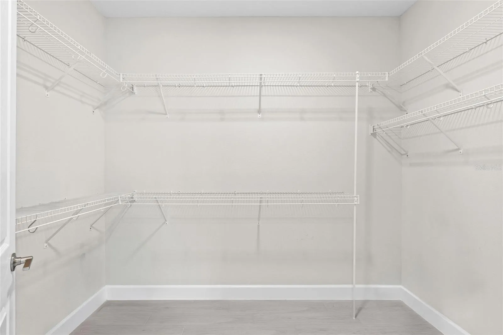One of two walk-in closets in the primary suite.