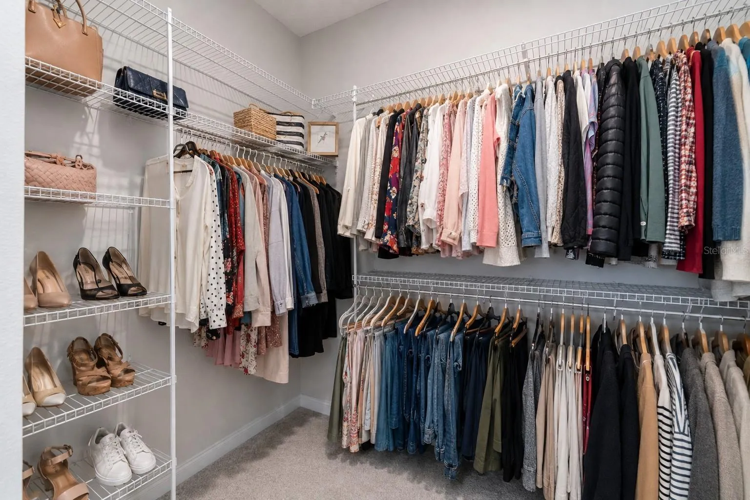 One of two identical walk-in closets in the primary suite.