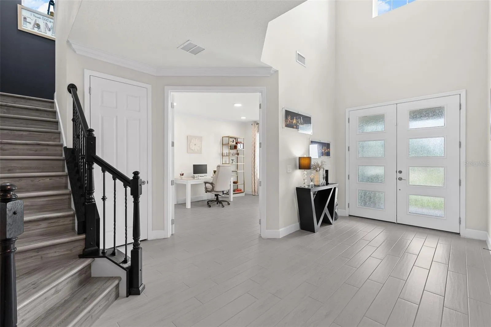 The light filled foyer welcomes you inside.