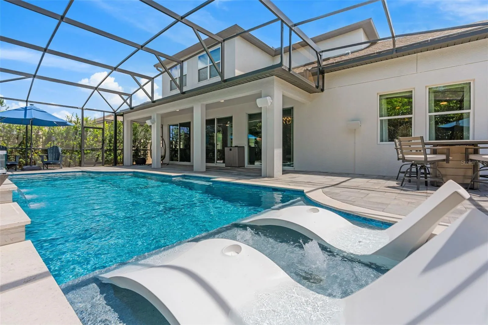 No need to go out, a resort-style retreat is right outside your back door.