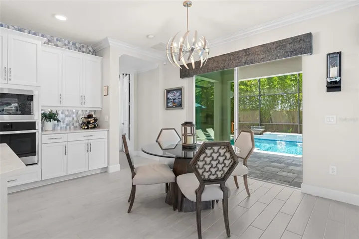 Casual dining with a view of the pool.