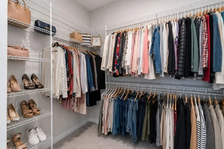 One of two identical walk-in closets in the primary suite.