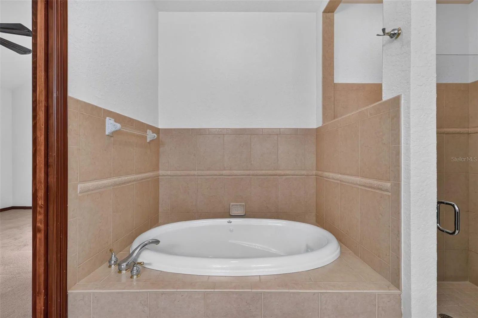 Unwind in the deep soaking tub after a long day, or step into the spacious walk-in shower just steps away.