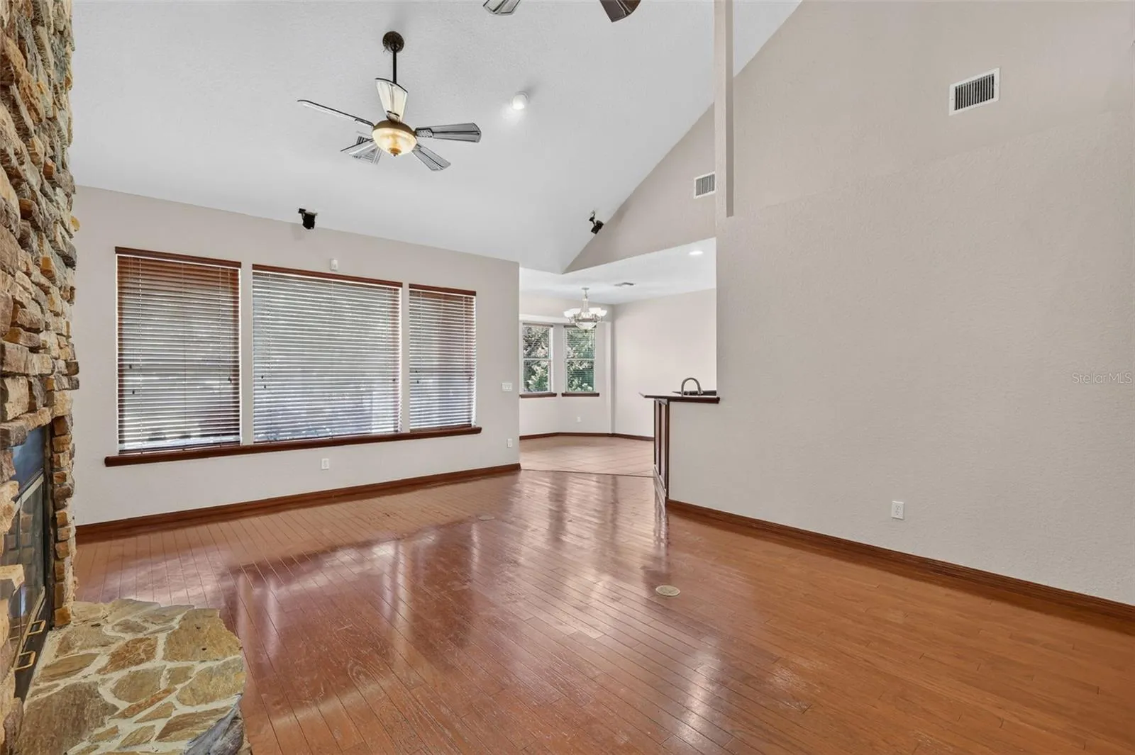 An open concept layout connects the living room seamlessly to the kitchen, perfect for entertaining or keeping family close.