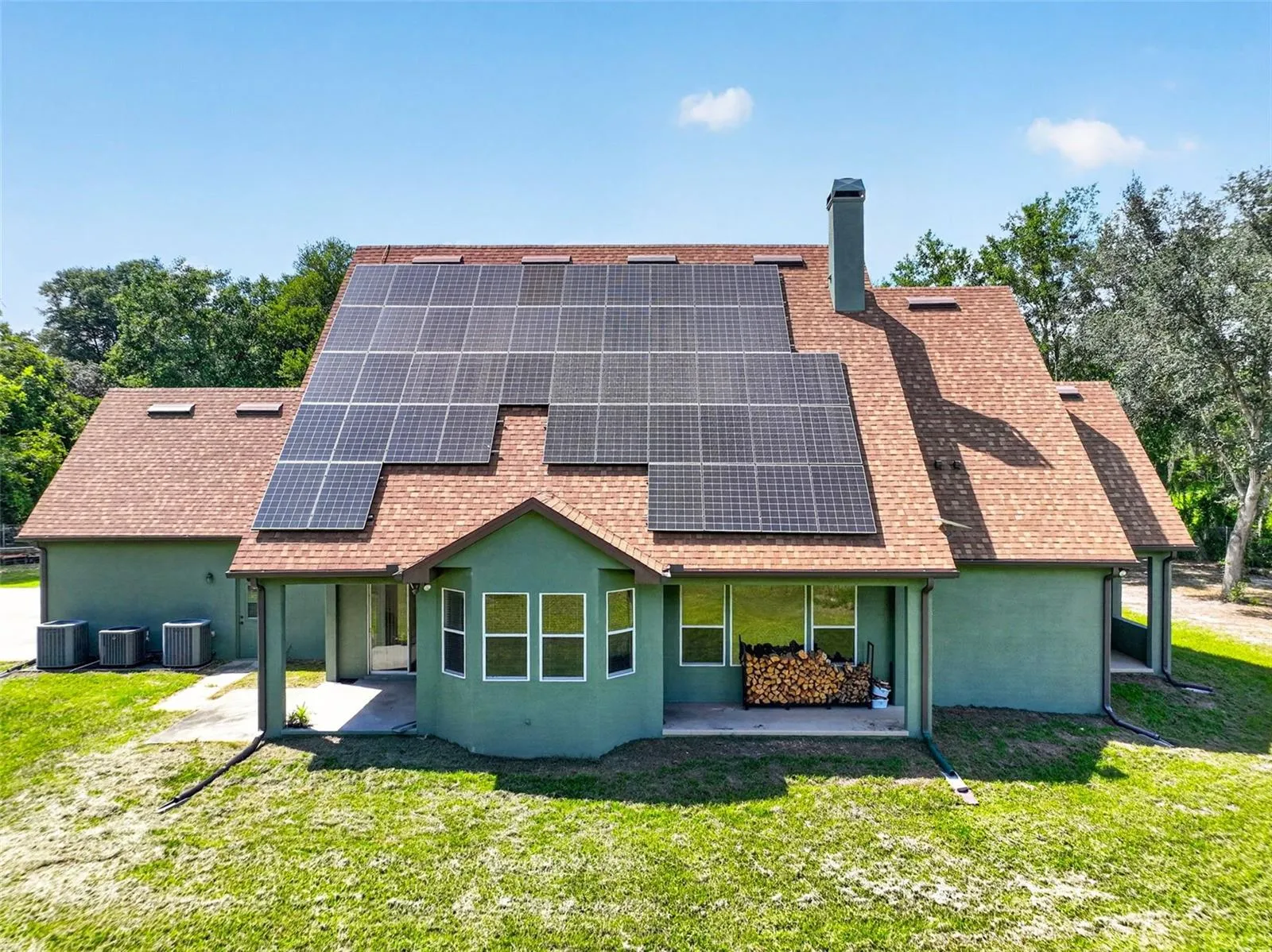 From above, the energy efficiency, outdoor living options, and scale of this property truly shine.