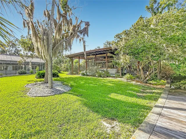 Backyard facing boathouse
