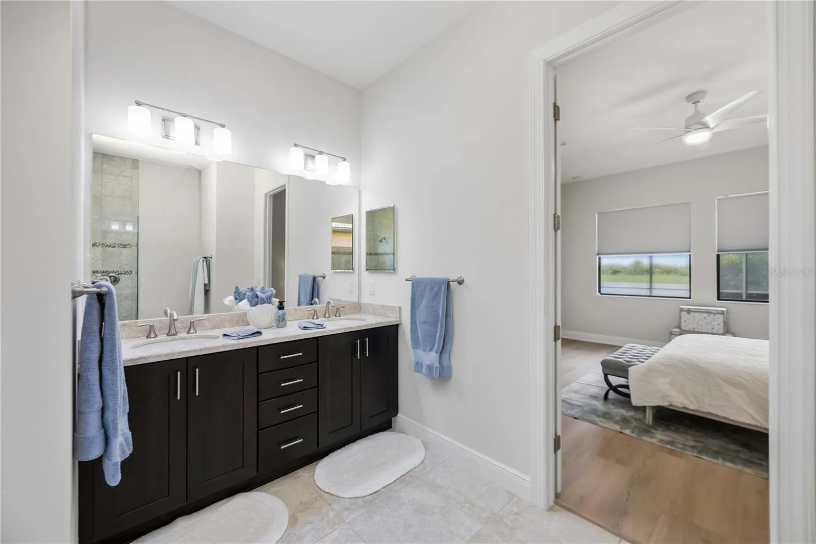 Vanity with dual sinks and a private water closet