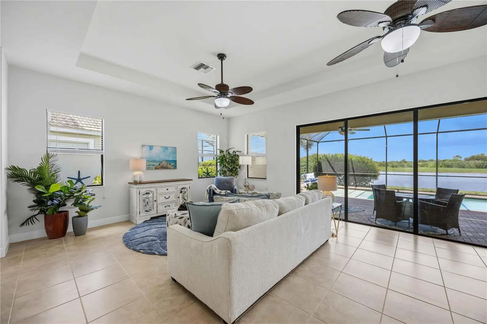 The living /great room in this home shares space with the dining area -