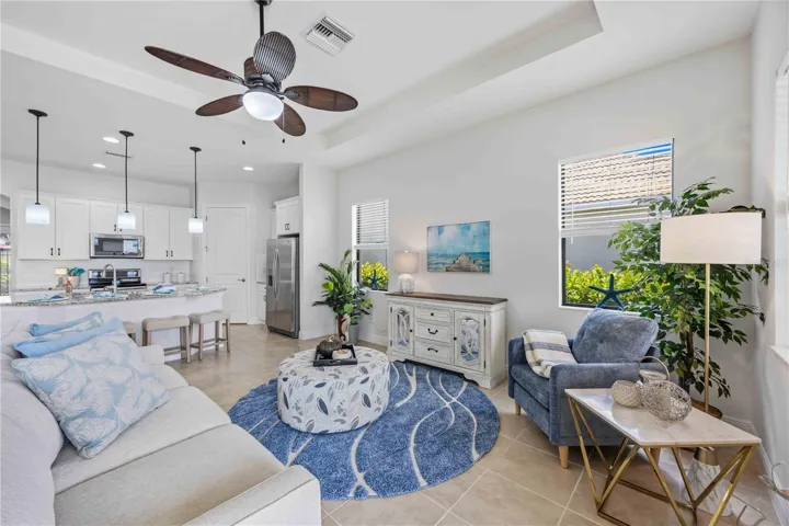 The living /great room in this home shares space with the dining area -