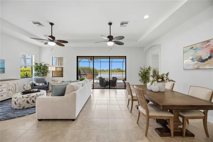 he living /great room in this home shares space with the dining area -