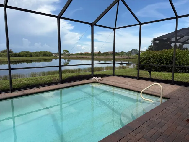 The pool overlooks water and Greenbelt -  no one can ever build there.