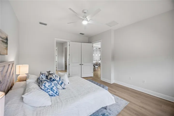 he primary bedroom is large and will easily accomodate a king sized bed and nightstands and dresser