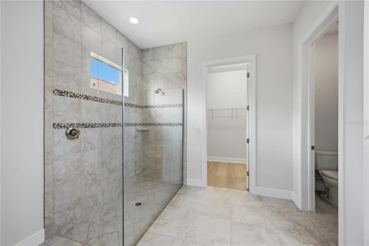The ensuite bath in this home is fabulous - large walk in shower