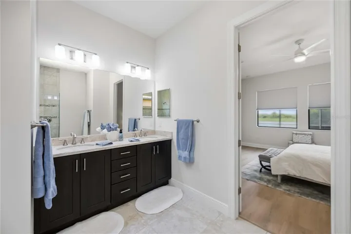 Vanity with dual sinks and a private water closet