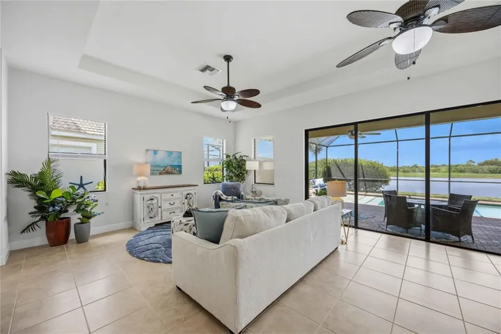 The living /great room in this home shares space with the dining area -