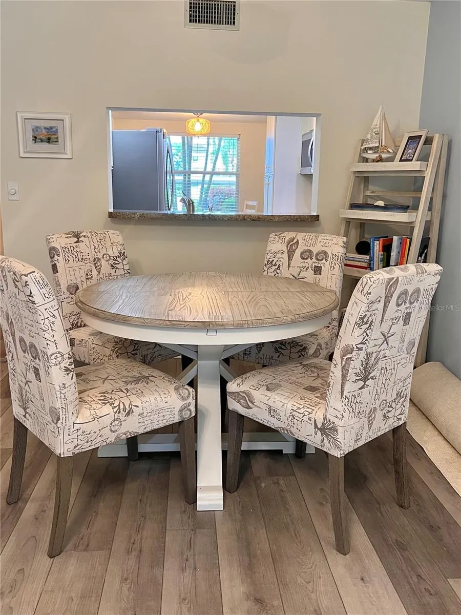 Dining area in the living room (there is a leaf for the table for more guests.