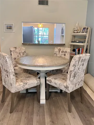 Dining area in the living room (there is a leaf for the table for more guests.