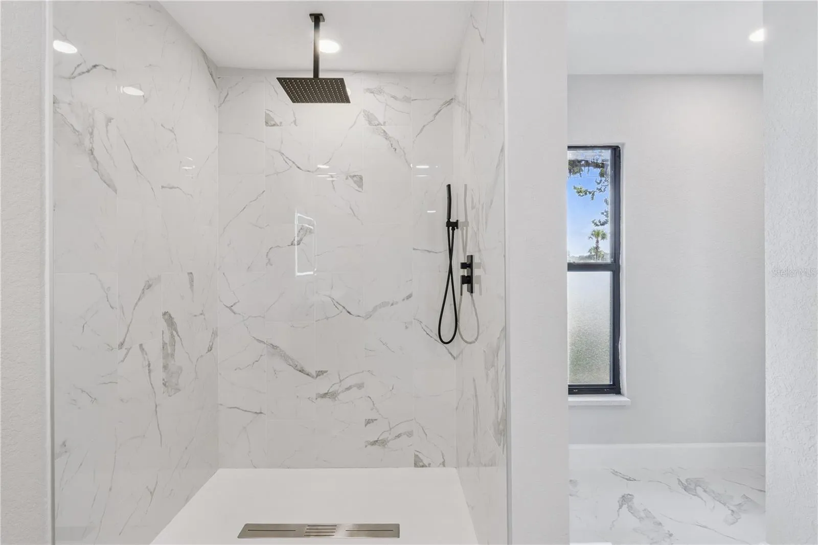 Large tiled primary bath shower