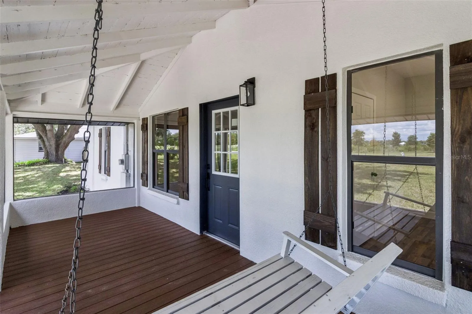 Relaxing covered front porch with swing