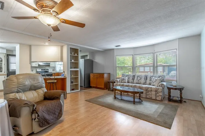 Large living room with bay windows