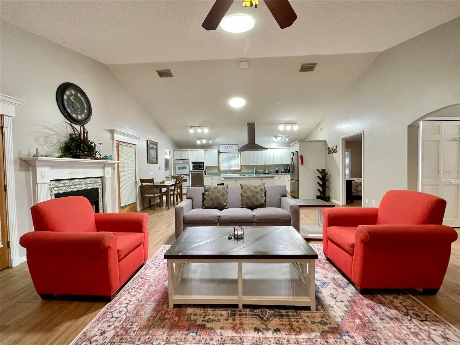 An open sightline from the living room into the kitchen creates a connected layout well suited for everyday living and entertaining.