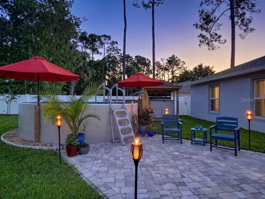 Tranquility at its best: Paver patio to Radiant Brand, above ground, salt pool