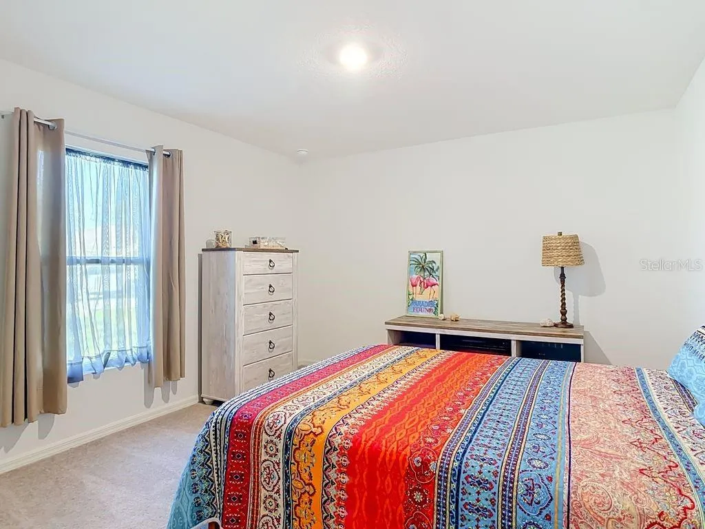 Bedroom 2: recessed lighting, large window  for plenty of natural light