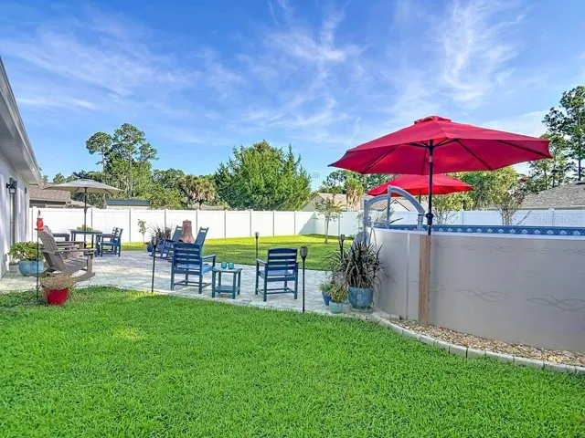 View 2 toward patio and fenced yard
