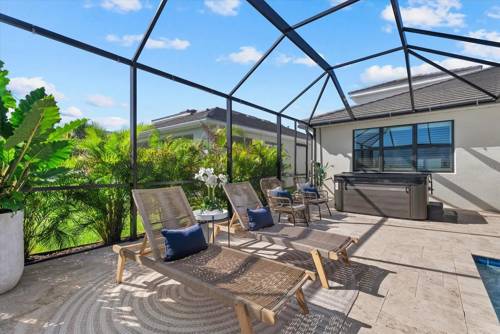 Large Lanai with lots of room for entertaining!