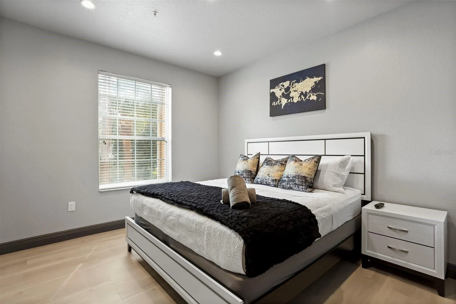 Primary suite offers plenty of space and natural light