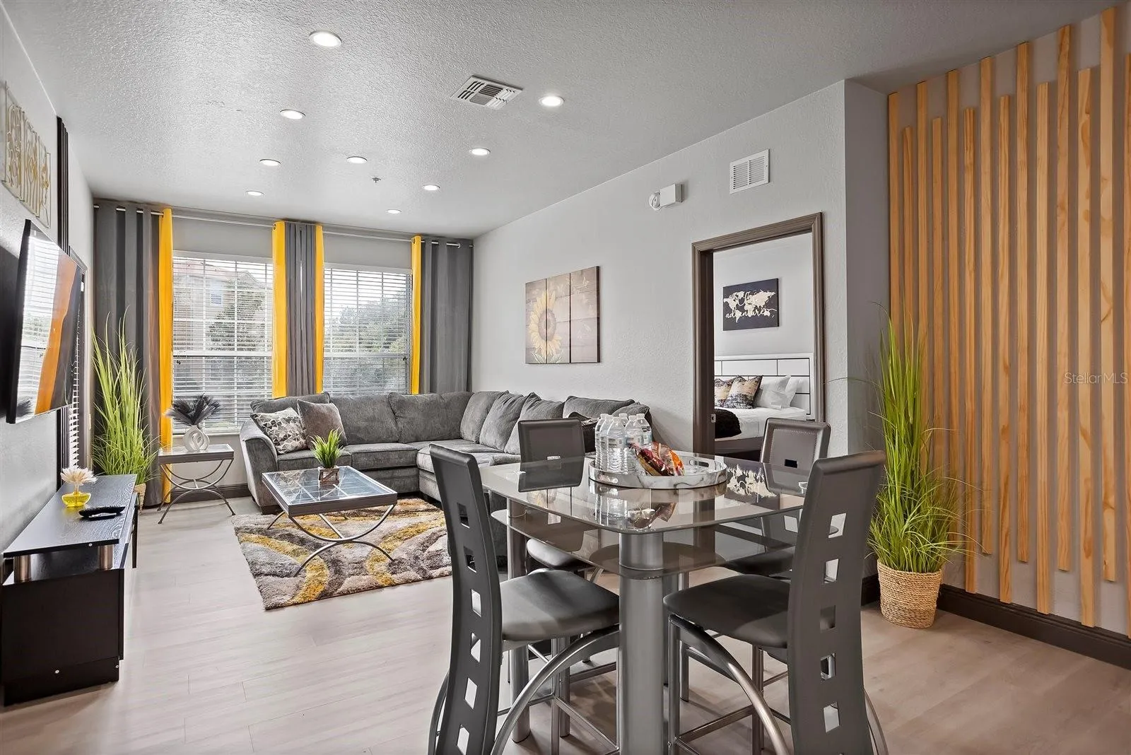 Kitchen flows seamlessly into the dining and living areas