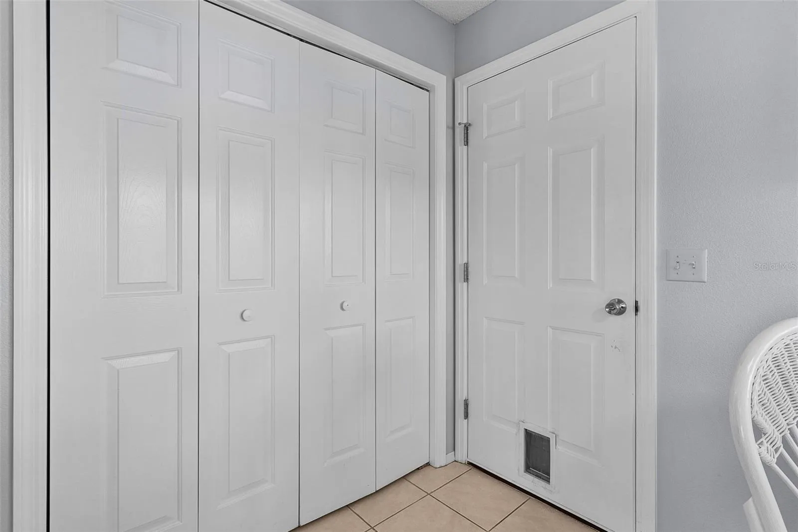 Laundry Area and Entry to 2 Car Garage