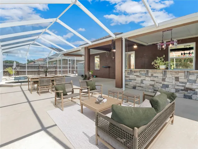 Outdoor Kitchen in pool area virtually staged
