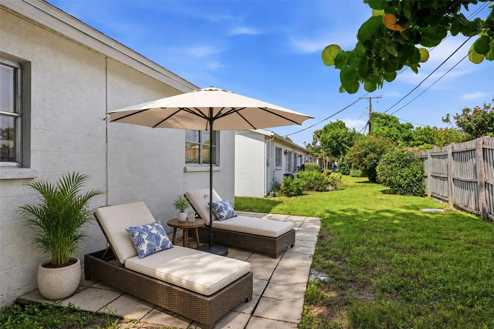 patio behind villa/condo, staged here