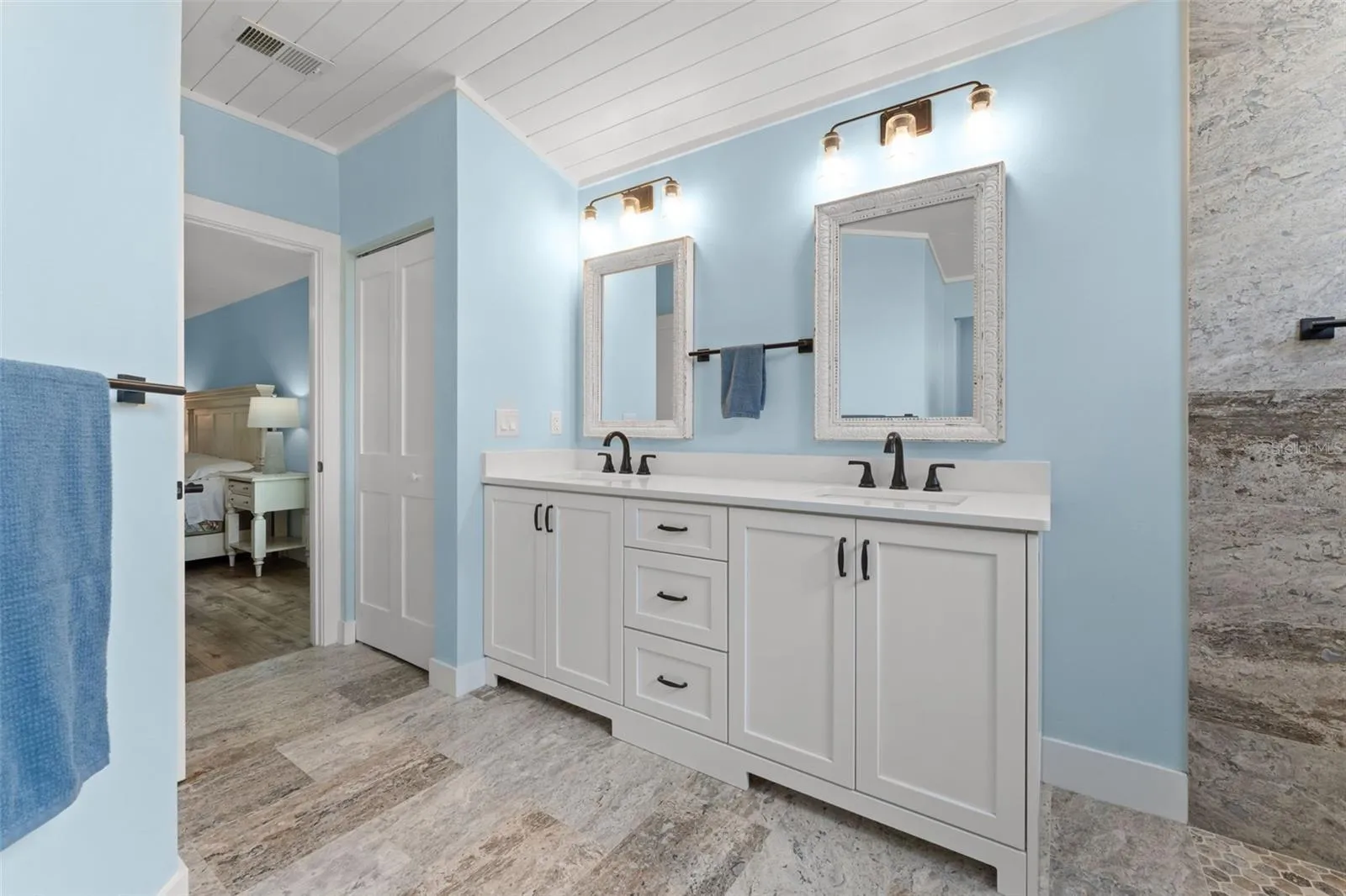Note the beautiful custome shiplap ceiling