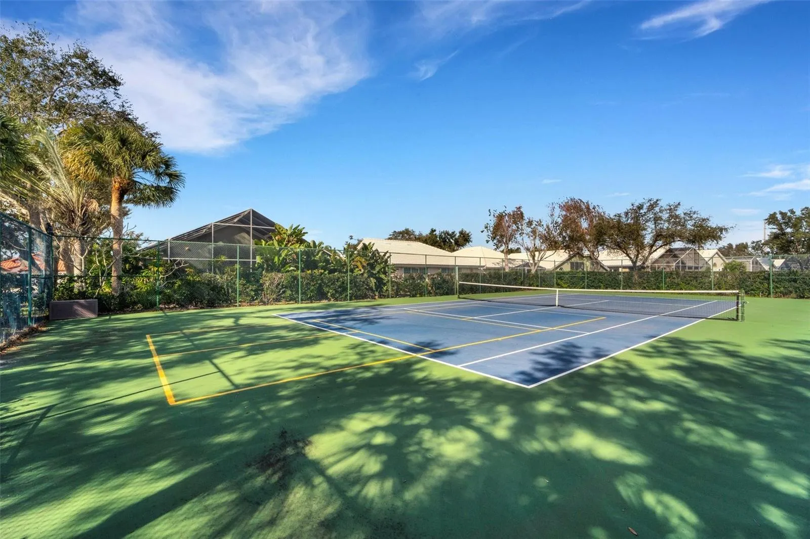 Neighborhood tennis/pickleball courts.