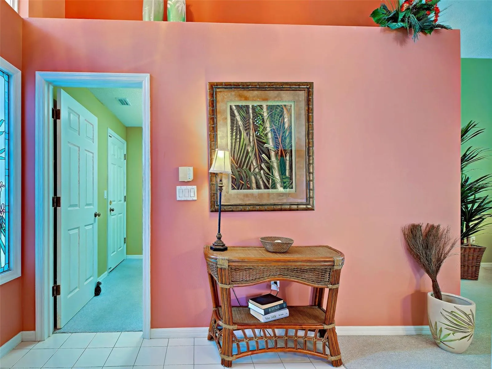 The laundry room to the left of the front door.