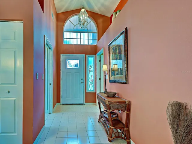 Looking at the front door from the dining room/living room area.