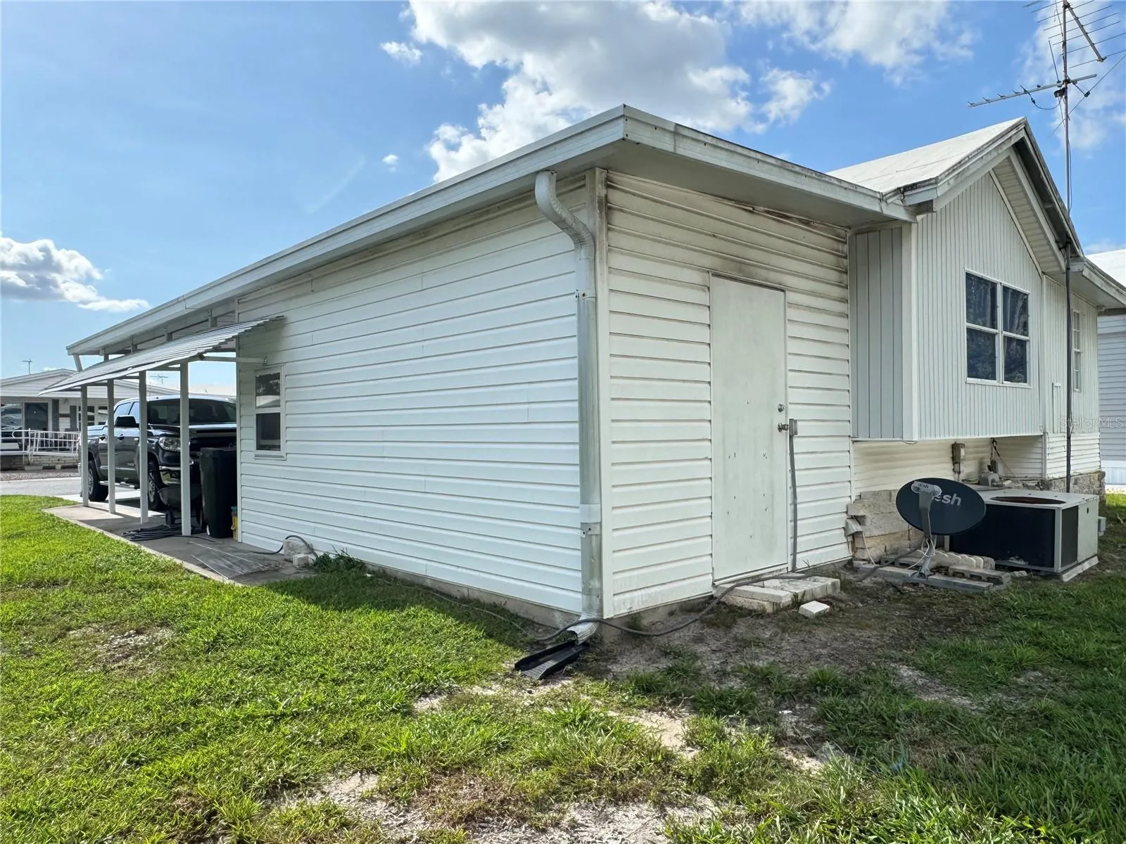 South Side of house with shed